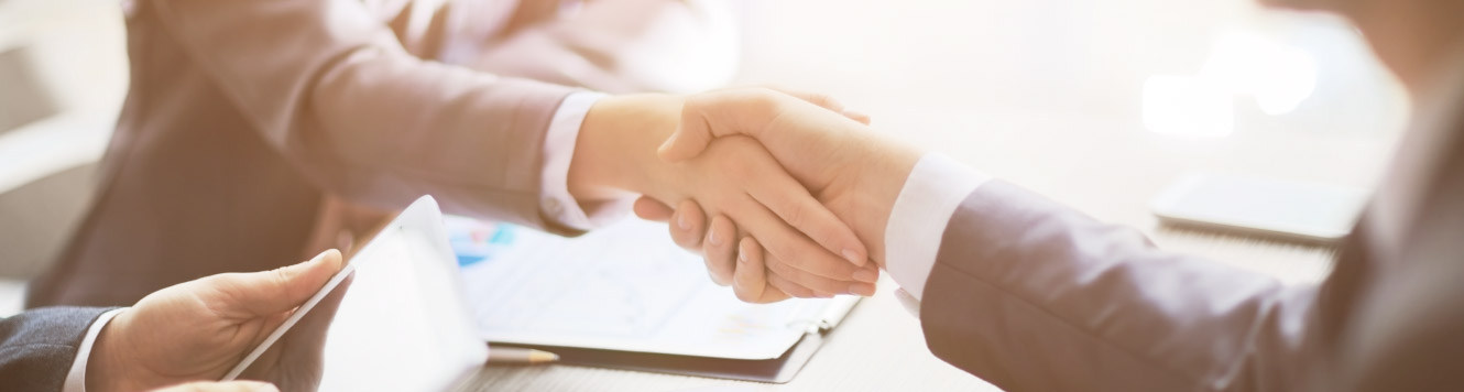 two people shaking hands