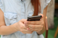 woman on cell phone, texting