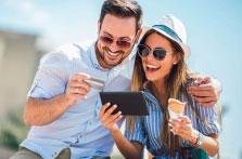 two people looking at a tablet